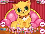 Screenshot of the Kitty Nail Salon game showing an adorable cat getting a colorful nail treatment
