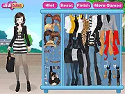 Screenshot of the Fit Suits dress up game interface showing a wardrobe full of mix and match clothes and accessories for a stylish outfit.