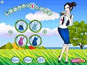 Screenshot of the Stylish Photographer dress up game showing a girl ready for a seaside photo shooting with a camera and stylish outfit.