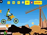 Screenshot of Motocross Bike Challenge game showing a rider on a dirt bike on a challenging off-road track, free online racing game