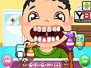 Baby at the Dentist free online game, using dental tools to clean a baby's teeth and remove plaque