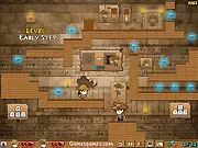 Gameplay screenshot of Pyramid Maze, showing two small treasure hunter characters standing on different platforms inside a brown and gold ancient Egyptian tomb filled with gems and obstacles.
