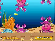 A small blue fish struggling to swim between large purple underwater monsters in the high-score arcade game Fish Flappy Online