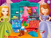 Princess Sofia and Princess Amber happily posing on a beach, wearing stylish summer outfits from the Sofia and Amber Summer Trip online game