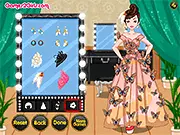 Fashion Model Sisters game screenshot showing twin models in glamorous dresses and high heels, playing a free online dress-up game on PlayArcadeHub.