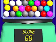 Screenshot of Candy Unstoppable gameplay, showing colored balls rolling within a container, a physics-based match three puzzle game, play online