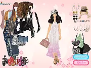 Screenshot of Butterfly Theme Dress Up game showing a girl in a beautiful costume, wearing accessories like butterfly-themed earrings and a necklace.