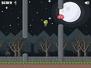 Screenshot of Flappy Zombie Go game showing the green zombie character attempting to jump between two large grey gravestones at night.