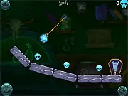 Screenshot of the Dracula Boom Puzzle Online game showing a cartoon vampire sleeping on a couch, with a round, rolling explosive potion about to detonate near him in a structured environment.