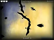 Screenshot of Monster Growth online game showing a small green monster avoiding a much larger enemy monster