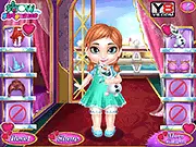 Frozen Babies Doctor & Dress Up game screenshot, featuring baby Elsa and Anna being cared for by a doctor, wearing cute baby clothes and holding toys.