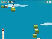 Screenshot of Key Tower game, showing a sky-high tower made of stacked crates and a key prompt for typing