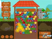 Screenshot of Maic Well Match 3 Bubble Shooter game, showing the player aiming a colorful projectile at a swirling line of circular creatures near a magical well