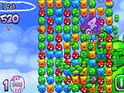 Screenshot of Bomboozle 3 free puzzle game showing colorful blobs and bomb power-ups