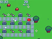 Screenshot of the Monster Rampage: Destroy Things online game, showing a large, round monster rolling through a house, breaking a table and a plant.