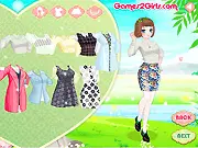 Screenshot of Sweet Angels dress up game showing a smiling girl in a fashionable outfit, various clothes and accessories for a lovely day, free online game
