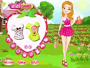 Screenshot of Strawberry Blonde Dress-Up game featuring a girl in a cute, country-themed outfit surrounded by fresh strawberries.