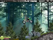 Extreme Dirt Bike free online game gameplay screenshot - motocross rider performing a massive jump over obstacles on a dirt track