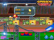 Super Cross Free Style online racing game screenshot showing a cartoon angry bird character on a motorcycle mid-jump on a dirt track.