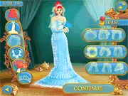 Screenshot of Ariel & Hector: Perfect Wedding dress-up game, showing the styled couple in a wedding gown and suit against a beautiful, romantic venue backdrop.
