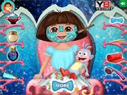 Screenshot of the Dora Makeover game showing Dora with a facial mask on and a selection of spa tools, followed by an image of her dressed up in a cute outfit with a clear face. Play the free online makeover game.