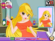 Screenshot of the Stella's Hair Salon Makeover game, showing Winx Club character Stella receiving a haircut and styling in a colorful virtual hair salon.