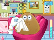 Free online Pou Eye Doctor caring and dress-up game for kids