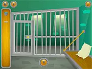 Screenshot from the Prison Break: Maximum Security online game, showing a jail cell with tools and objects available to solve the escape puzzle