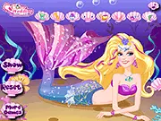 Pearl Princess Sparkle Dressup free online mermaid game, styling Barbie with shimmering tails and pearl accessories.