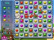 Super Candy Gems match 3 puzzle game screenshot showing colorful candies and gems on a grid
