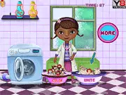 Screenshot of Doc McStuffins Washing Dolls online game showing Doc and her friends sorting colorful plush dolls next to a washing machine.