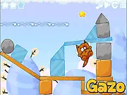 Fly Kitty Fly free online game screenshot showing a cute cat hovering over ice blocks near a star and a red laser beam