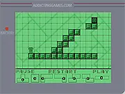 Screenshot of Tetrom online puzzle game showing the character standing on strategically placed Tetris-style blocks attempting to reach the exit