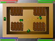 Battle Tank 2 free online game screenshot showing four colored tanks battling on a military-themed map