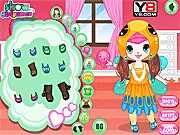 Little girl Emma in a stylish bird costume and feathered dress in the online dress up game