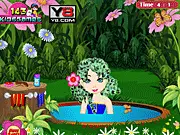 Little Fairy Makeover free online game screenshot showing Emma getting a bath and later wearing a new fairy dress and wings