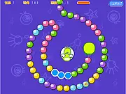 Gameplay screenshot of Pengapop 2, showing a space-themed background and colorful bubbles being shot by a cannon.