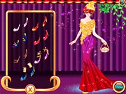 Ellie Masquerade Ball Dress Up game screenshot showing Ellie in an elegant gown and mask