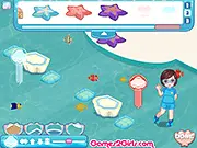 Tropical Aquarium Designer free online game where players decorate and fill a fish tank with colorful fish and coral