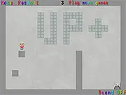 Gameplay screenshot of FuryFury showing the character standing near a stack of boxes and a glass barrier.