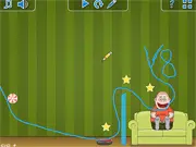 Screenshot of the Hungry Grew puzzle game showing a line being drawn to guide a piece of candy toward the character Grew.