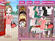 On the Phone Dressup free online game featuring a girl holding a phone in a cute outfit