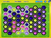 Screenshot of Hex Match free online puzzle game showing a grid of colorful hexagons being matched and a lightning bolt power-up visible.