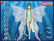 Screenshot of the Ocean Fairy Dress Up free online game showing a magical fairy underwater with flowing gown and a sea backdrop
