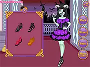 Screenshot from the Halloween Party Costumes dress up game showing a model with options for both creepy monster makeup and cute festive outfits, available to play free online.