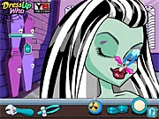 Frankie Stein's Human Halloween game banner showing the Monster High ghoul in an elegant human-inspired dress, play free dress up game