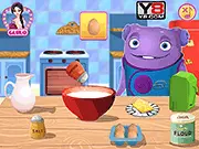 Oh Cooking Donuts free online baking game featuring the alien character 'Oh' making and decorating donuts