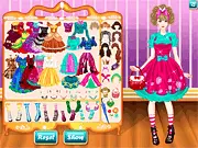 Screenshot of the Lolita Beauty Queen dress-up game showing a character wearing a frilly, pink and white sweet Lolita dress with a matching bonnet, accessories, play free online game