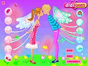 Angel Kiss Flash game screenshot, two angels kissing under a rain of stars, play free online kissing game