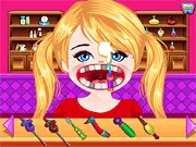 Baby crying in pain with a toothache before getting her teeth fixed by a dentist in the Baby Real Dentist free online doctor game
